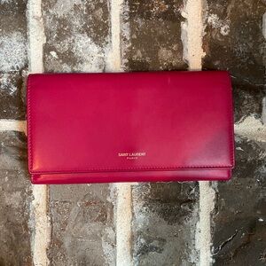 Saint Laurent Leather Continental Wallet in Fuchisa